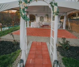 Wedding arch facing the reception tables